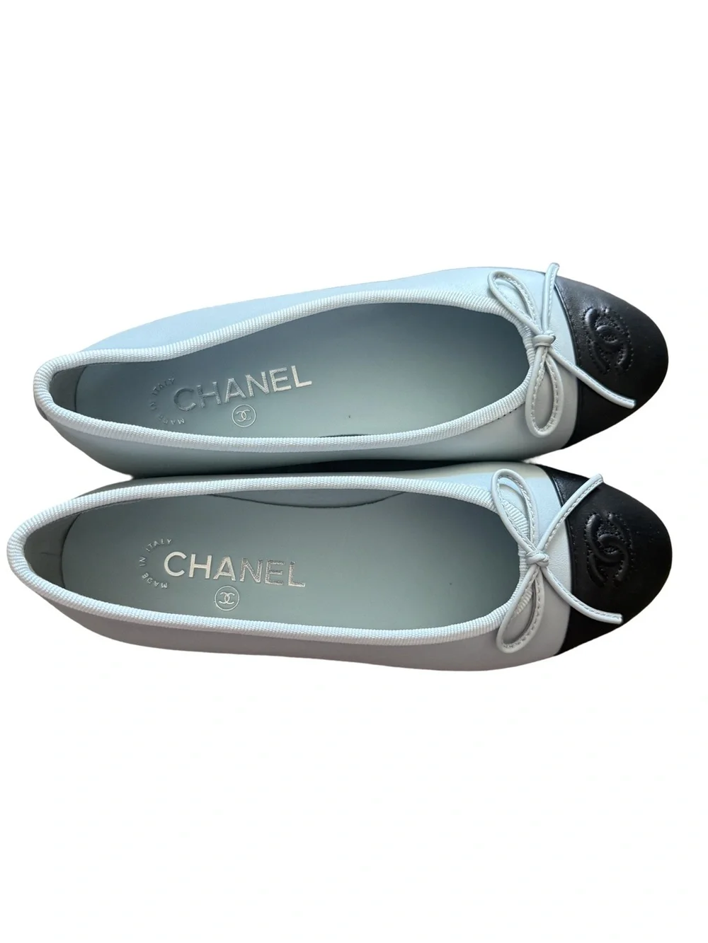 CHANEL Light Blue Leather Ballet Flats with Black Cap Toe and Bow
